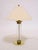 Frederick Cooper was known for the high quality of their lamps and this handsome table lamp in lucite and brass is a prime...