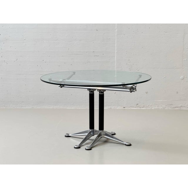 Iconic dining table from the modular burdick table system, designed by bruce burdick for herman miller. The generous clear...