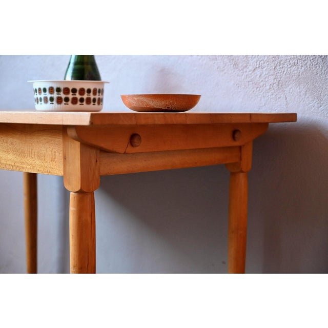 Here's a lovely solid wood bistro table, perfect for a café or pastry shop! Rectangular yet comfortably sized, this retro...