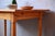 Here's a lovely solid wood bistro table, perfect for a café or pastry shop! Rectangular yet comfortably sized, this retro...