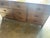 Beautiful nine-drawer dresser with carved countersunk interlaced dual ring drawer pulls, and molded and shaped apron on...