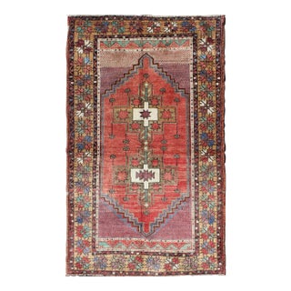 Mid 20th Century Vintage Turkish Oushak Rug With Tribal Medallion in Red Green Yellow & Purple For Sale