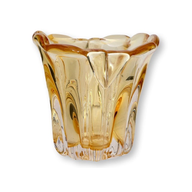 Midcentury Italian Murano glass vase with a sculptural flared form and softly ruffled rim. Hand blown in warm golden glass...