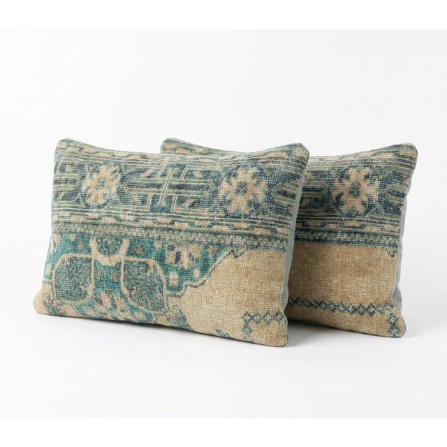 This beautiful 16'' x 24'' pillow cover set was made from authentic Turkish rug pieces. Bright colors of wool adorn the...