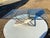 This Vintage Postmodern Tessellated Stone & Glass Sculptural Coffee Cocktail Table in the style of Maitland-smith company...