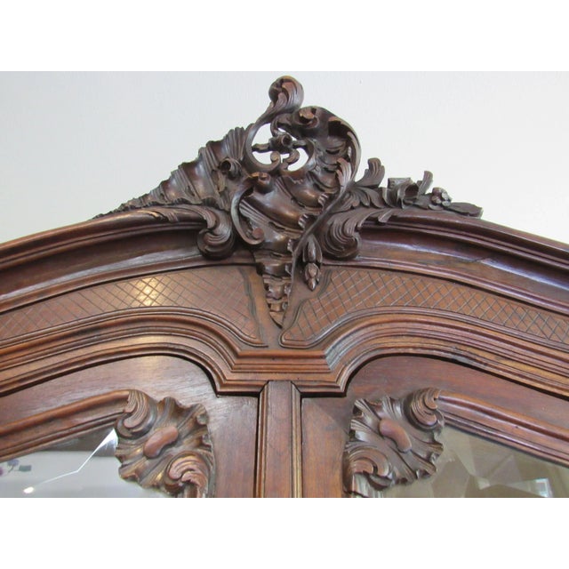 Wood Circa 1900 Two Part Highly Carved French Walnut China Cabinet Court Cupboard For Sale - Image 7 of 13