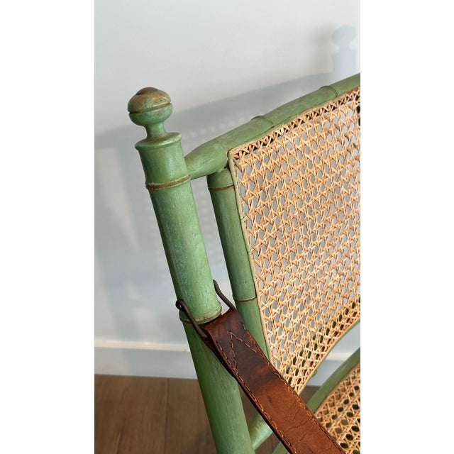 Pair of 1970s folding safari chairs in weathered faux bamboo with caned backs and seats For Sale - Image 9 of 12