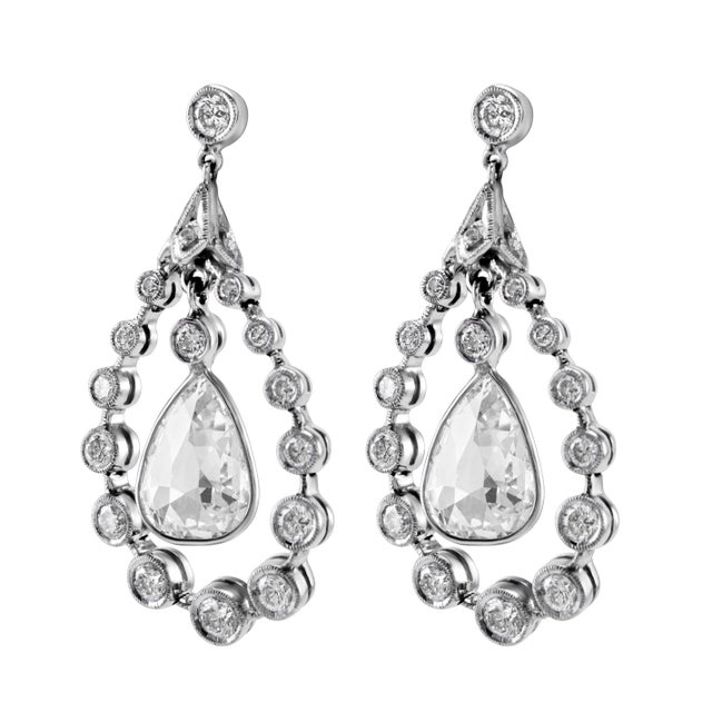 Unique vintage pear shape rose cut natural diamond earrings. 8.90 carats total diamond weight. 2 pear shape rose cut...