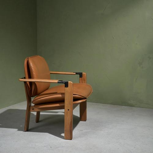 Lounge chair model 'Dueacca' by Franco Poli for Bernini, Italy 1985. Executed in solid walnut with brass and metal details...