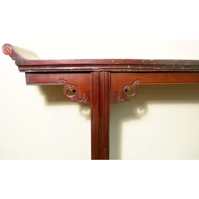 This antique Chinese Altar Table is handcrafted with Zelkova Wood. Traditional Chinese "Scrolls and Ganoderma" design is...