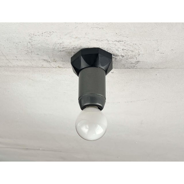 Italian wall and ceiling lights by Arteluce, designed by Paolo Piva in the 1980s. A postmodern design. The Le Stelle...