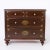 Standout antique English chest hand crafted in pine with four drawers and turned feet, painted and decorated later. Likely...