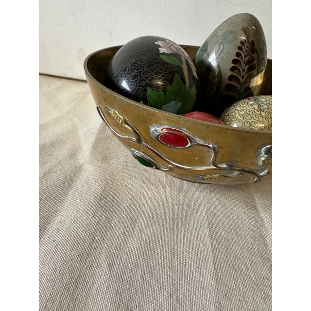 Up for consideration is a beautiful collection of painted eggs in a brass bowl. This would look lovely in your home and it...