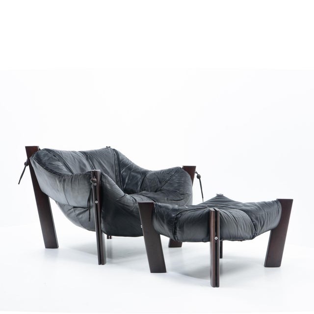 Lounge chair and matching ottoman model MP 111, designed by Percival Lafer and produced in Brazil in the 1970s. . The...