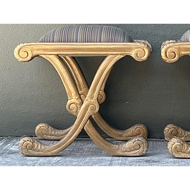 Elevate your interior with this striking pair of vintage Regency-style X-frame benches. Inspired by the classical "Curule"...