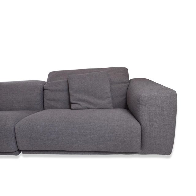 The Design Within Reach Case Kelston Sofa offers a refined blend of modern comfort and architectural simplicity, featuring...