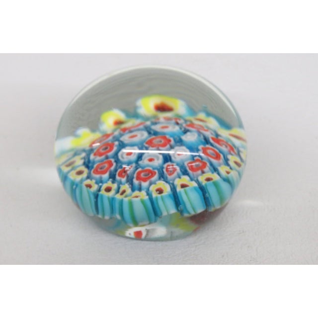 This gorgeous Paper Weight is made of multicolored art glass. This stunning vintage piece features a colorful millefiori...