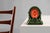A vintage table lamp from the Whitbreast Pale Ale brewery. In green glazed ceramic with the iconic red Whitbread logo in...
