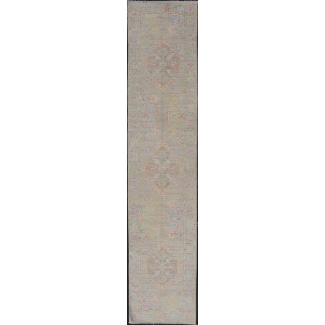 Hand-Knotted Oushak Runner With Medallion Design on a Tan Field With Red & Blue For Sale - Image 13 of 13