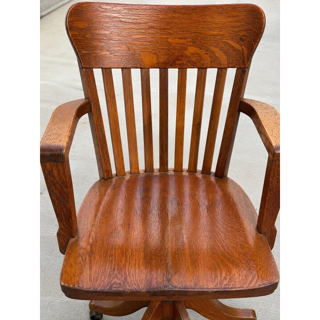 American Antique Solid Oak Adjustable Swivel Office Chair With Original Cast Iron Mechanism & Casters, c.1900–1925 For Sale - Image 3 of 6