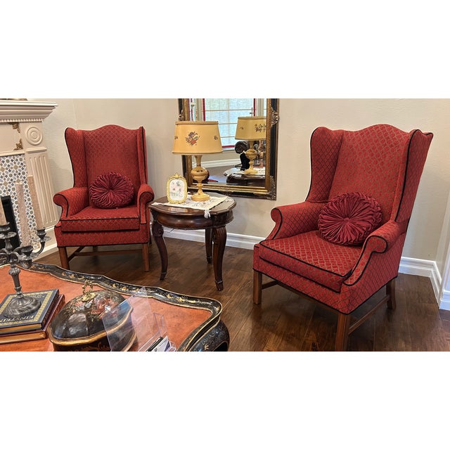 Pair of vintage Traditional lounge chairs, in colour red.