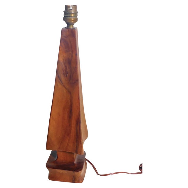 This table lamp, is carved in the wood. The wood has this light brown color of this wood, with the old patina. This lamp...