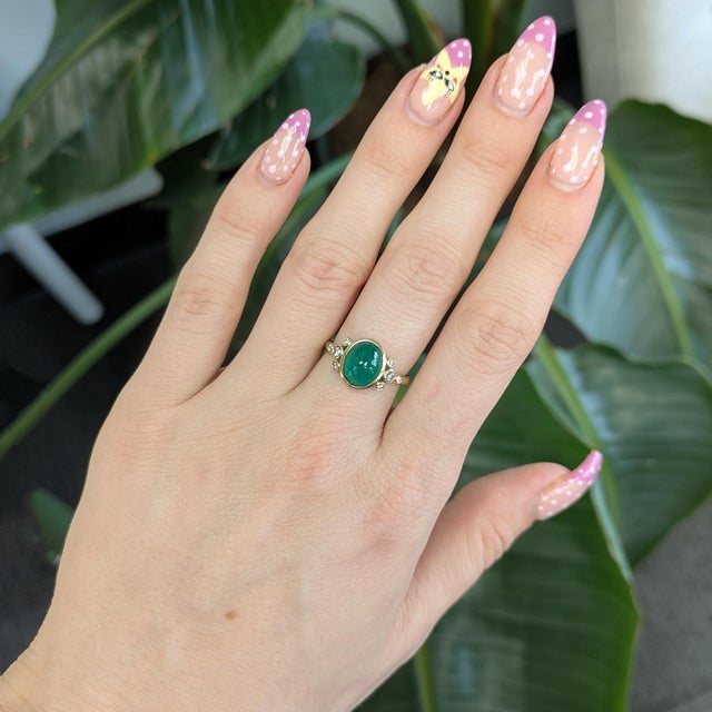 Radiant 2.8cts Zambian emerald (10x8mm) set in solid 14K gold, showcasing a vivid, rich green that captivates at every...