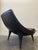 This contemporary leather Carolina lounge chair, designed by Doriana & Massimiliano Fuksas, features beautifully button-...
