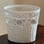 Offering a lovely wicker wastepaper basket from the mid-20th century. This beautifully handwoven wastebasket comes in its...