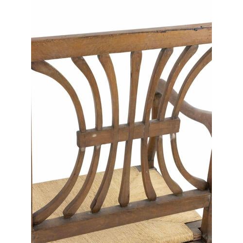 Wooden chairs realized in Europe in the late 19th Century. Square-shaped with open backrests and straw seats. Good condition.