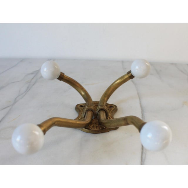 Vintage Brass and White Porcelain 4-Hook Wall Mount Coat or Hat Hanger For Sale - Image 4 of 8