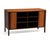 A Mid-Century tambour front cabinet or credenza designed by Edward Wormley for Dunbar Furniture of Bernie, Indiana....