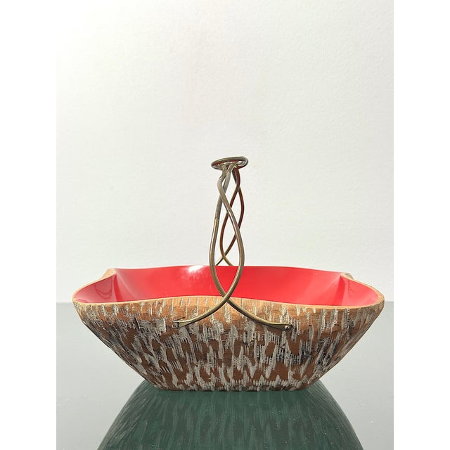 Basket centerpiece designed by the renowned Aldo Tura for Macabo (Cusano Milanino) in the 1950s. This object is not a...