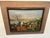 This is looks to be a mediterranean village seascape oil painting. It has its original frame and wire to hang. There are...