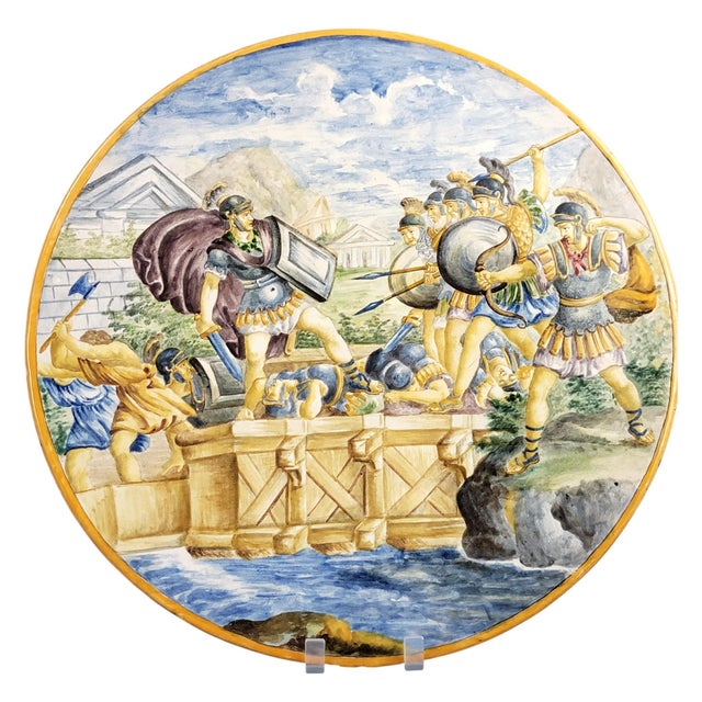 Exceptional Italian polychrome maiolica charger in traditional tin-glazed earthenware, decorated with the powerful...