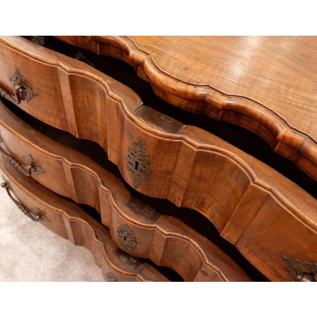 18th Century French Crossbow Front Chest of drawers in Walnut Wear consistent with age and use.Aix en Provence ironworks...