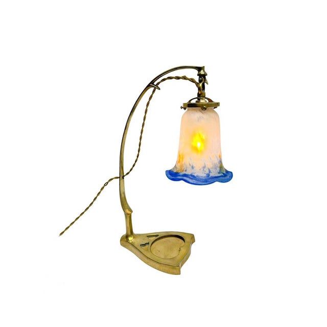 Art Nouveau table lamp made of Brass, with a lampshade of Paté de Verre (Glass Paste). Very nice elegant design, made in...