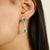Elevate your jewelry collection with these captivating earrings, masterfully crafted in luxurious 14k yellow gold. Each...