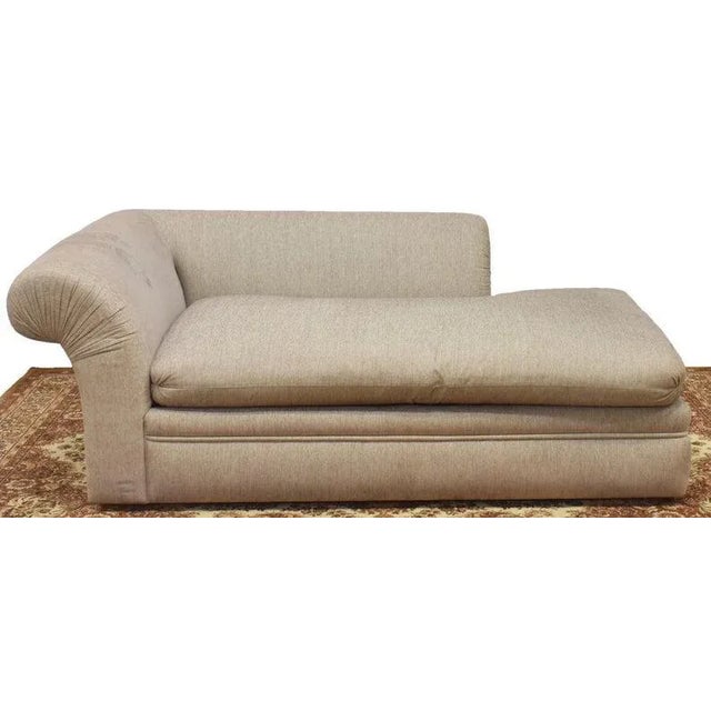 A fine contemporary A. Rudin chaise lounge sofa, in grey upholstery, with elegantly rolled back and single arm, down and...