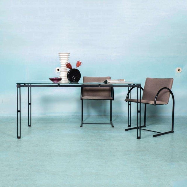 Add a touch of sophisticated minimalism to your interior with this unique dining table from the 80s. Inspired by the...