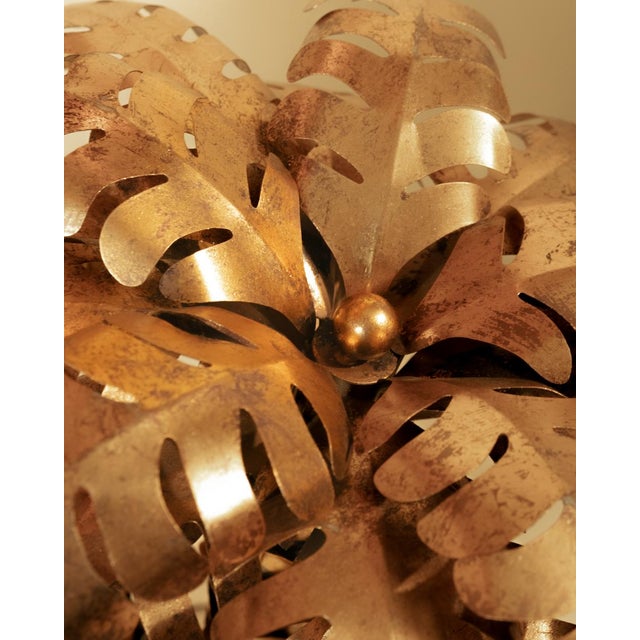 A stunning palm tree-inspired floor lamp in the distinctive Maison Jansen style. A classic of the Hollywood Regency...