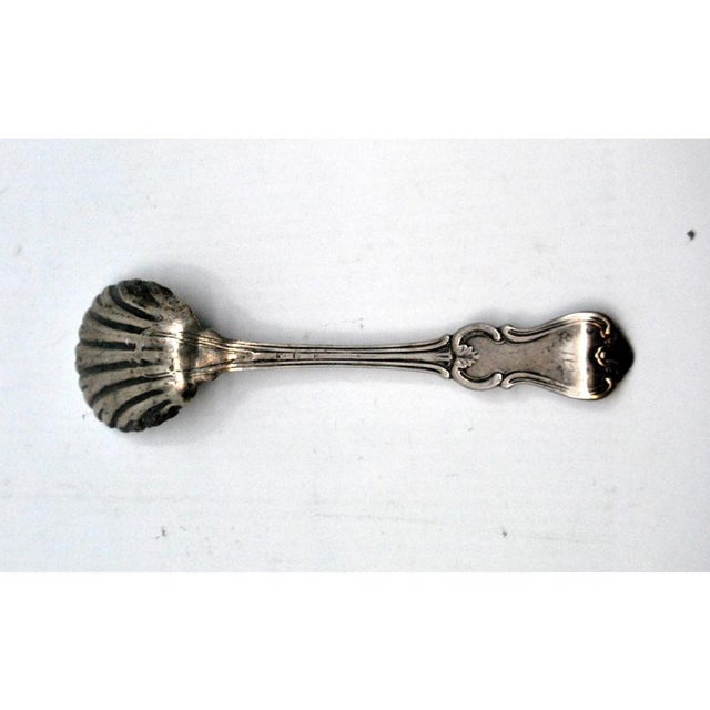 Silver Sugar Spoon in Shell Shape with Crimped Handle, in Very Good conditions. Designed from 2000 This piece has an...