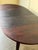 Beautiful Danish Mid Century Modern dining table crafted in richly grained rosewood. This elegant oval table features...