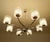 Large Vintage 1970s Kaiser Pendant Light, featuring an unusual design with eight intertwined curved chrome spokes,...