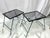 Pair of mid-Century Modern Atomic Black Metal Mesh Stackable Patio Garden Side Tables with Flare Legs. In the style of...