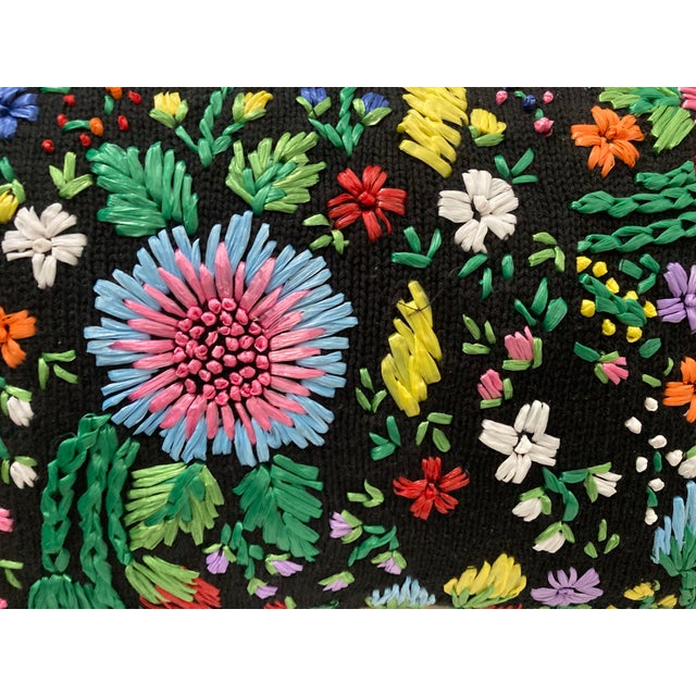This multicolored raffia hand embroidered floral boudoir pillow is a luxurious addition to any living room. Measuring 16...