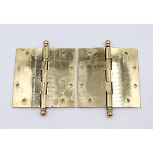 These ball bearing door hinges are made of polished brass with ball tips, five knuckles, and a template hole pattern. Made...