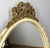 This charming Vintage Shabby Chic mirror features an elegant oval frame topped with a beautifully detailed bow motif,...