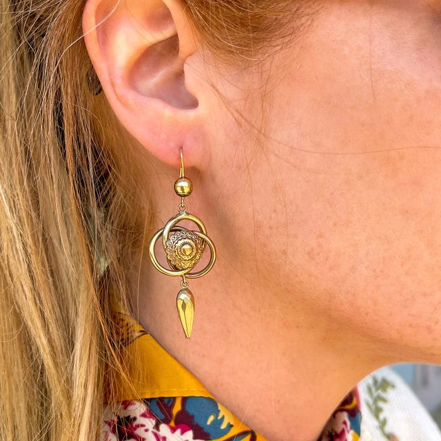 These Victorian earrings capture a timeless symbol of love and eternity with their beautifully crafted love knots....