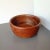 Bowl for food or to be used as vide poche made in one piece of teak wood symmetrical shape of revolution.